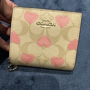 Brand new Coach wallet with pink hearts 💕